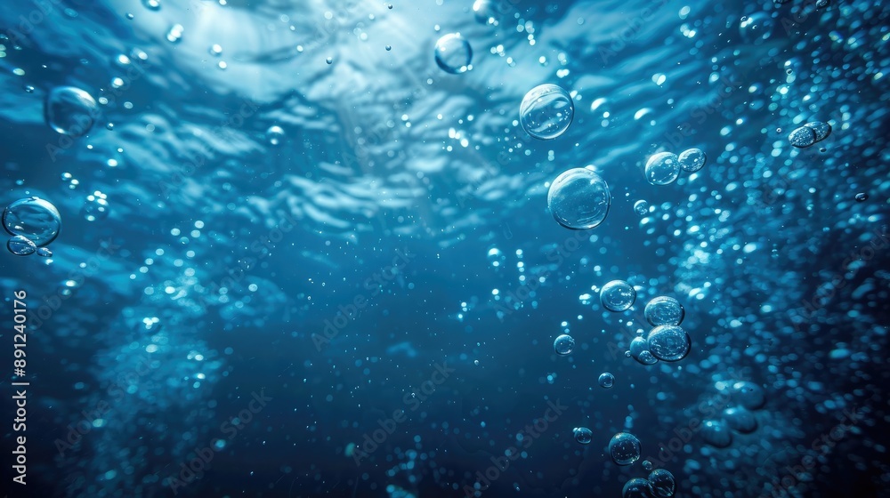 Many bubbles emerge from the deep blue ocean floor Many bubbles emerge from the deep blue ocean floor