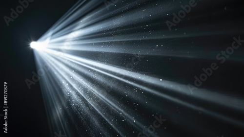 Obraz na płótnie Close-up of a focused light beam cutting through darkness on black w salonie