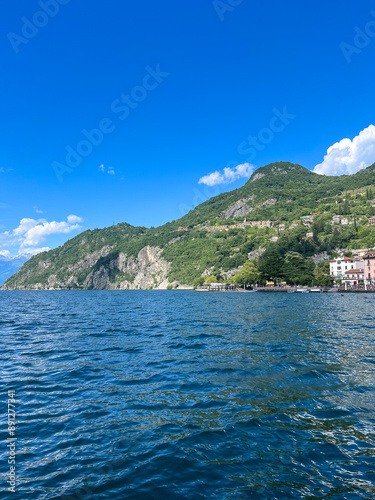 Lake Como. Italy. View from the lake of green hills. Famous tourist destination, natural bifid fjord. photo