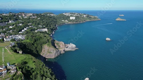 Torquay, Torbay, South Devon, England: DRONE VIEWS: Meadfoot beach, coastline, Shag Rock, Thatcher Rock and Orestone. Torbay is a popular UK holiday destination renowned for its beautiful coastline. photo