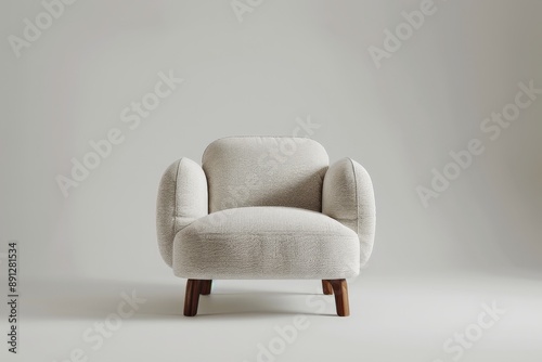 This retro cream-colored armchair boasts wide padded arms and a cushioned seat, presenting a blend of nostalgia and comfort that easily complements contemporary or vintage decor.