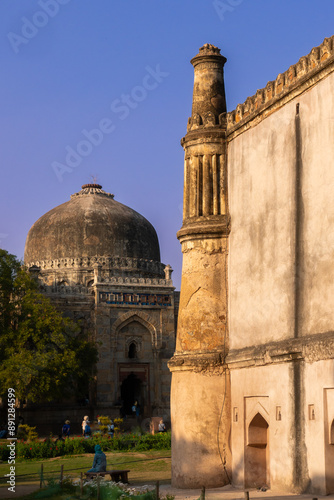 Lodhi Gardens - New Delhi, India.  The park spreads over 90 acres (360,000 m2), it contains Mohammed Shah's Tomb, the Tomb of Sikandar Lodi, the Shisha Gumbad and the Bara Gumbad. photo