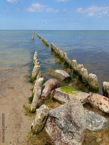 breakwaters on the sea in calm weather