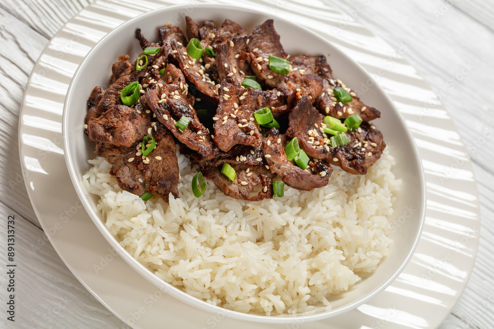 Bulgogi, Korean BBQ Beef with rice, top view Bulgogi, Korean BBQ Beef with rice, top view