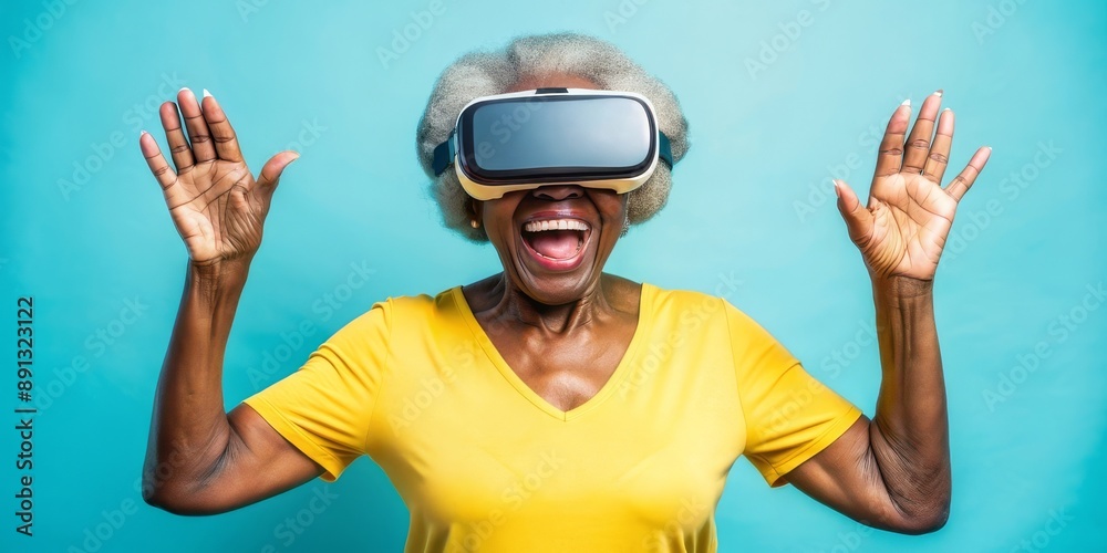 Senior woman experiencing virtual reality with joyful expression Senior woman experiencing virtual reality with joyful expression