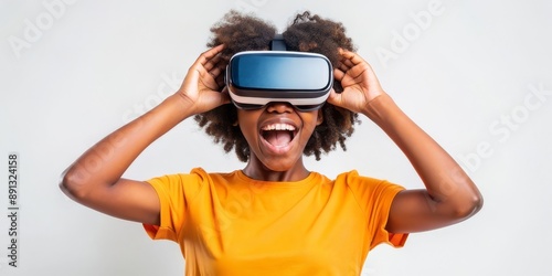 Teenager black girl experiencing virtual reality with joyful expression