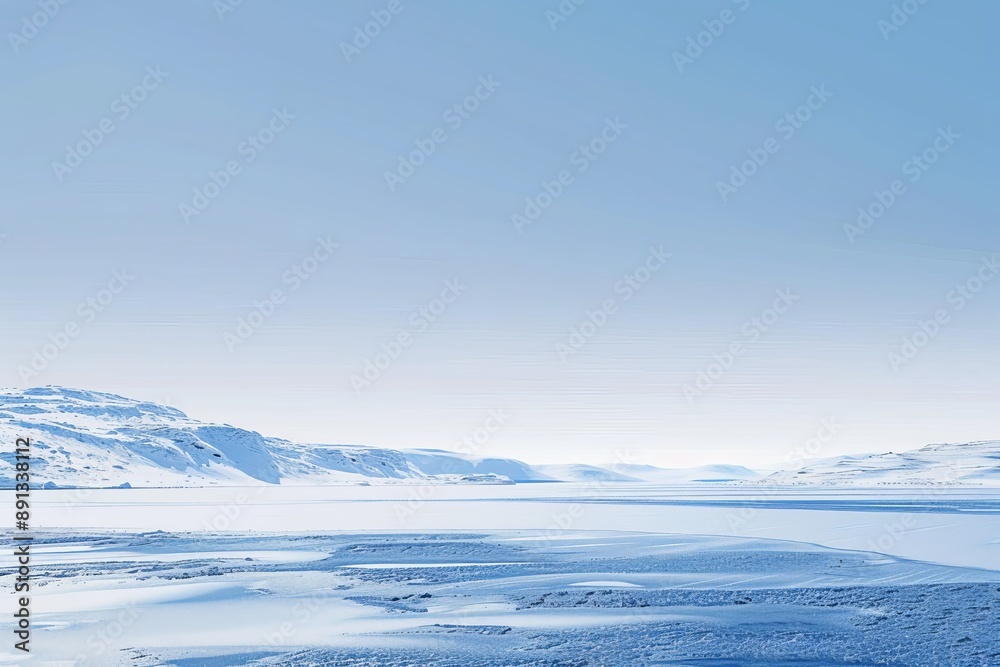 A vast and open snow-covered landscape stretches under a clear, blue sky, showcasing a serene and peaceful winter scene, perfect for background use.