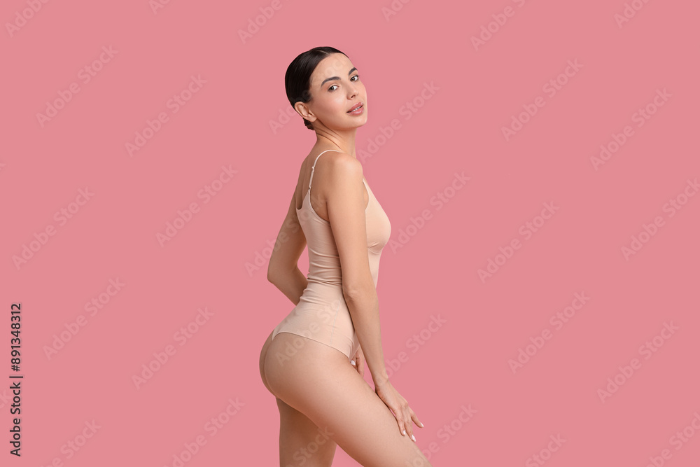 Beautiful woman with perfect skin on pink background. Body care Beautiful woman with perfect skin on pink background. Body care