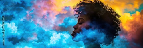 Surreal digital artwork of a silhouette of a woman's profile enveloped in abstract colorful clouds with an ethereal feel.