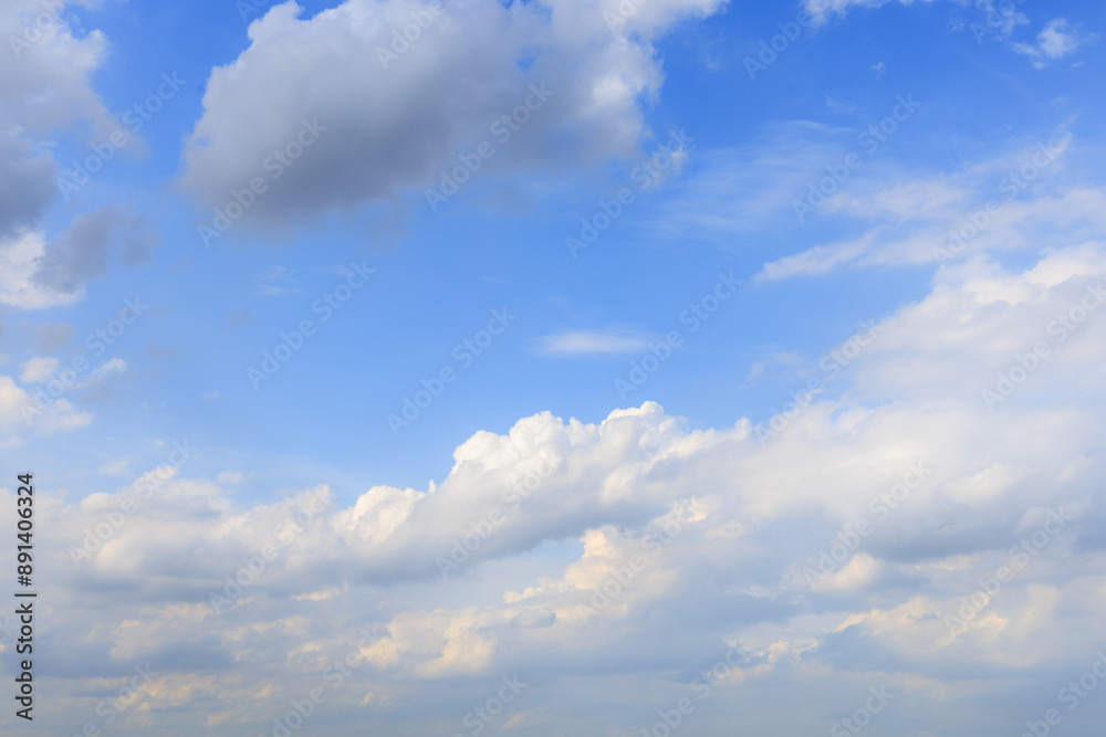 The sky is blue with a few clouds scattered throughout The sky is blue with a few clouds scattered throughout