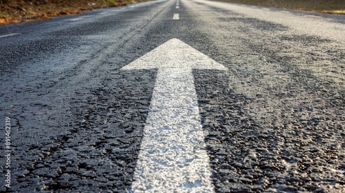Wallpaper Mural An asphalt road stretches into the distance with a painted white arrow pointing forward, symbolizing motivation, progress, and the concept of continuous growth and forward movement. Torontodigital.ca