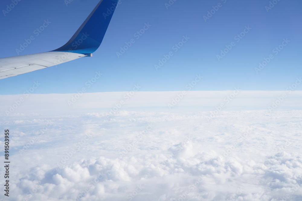 view from airplane, aviation, clouds, sky, sunlight, flight, natural beauty, travel, altitude, atmospheric landscape, airplane in the sky, air travel, aerial view, blue sky, sunny weather, horizons, a