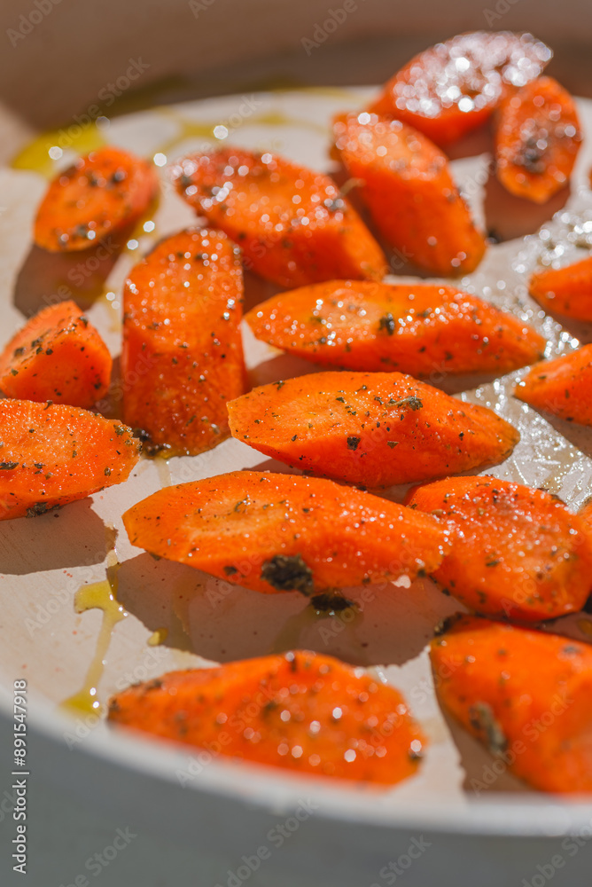 roasted carrots on pan with colorful patterns of orange carrot roasted carrots on pan with colorful patterns of orange carrot