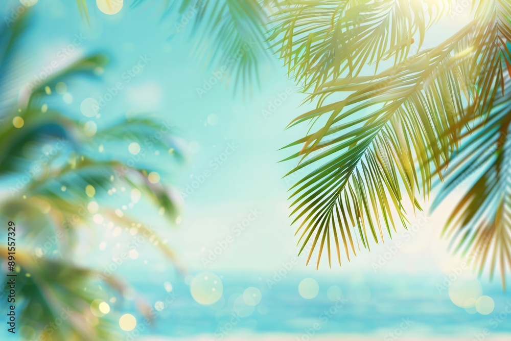 Green palm leaf on tropical sand beach with blurred blue sea with bokeh sun light. Summer vacation and travel concept. Background for card, banner, poster with copy space Green palm leaf on tropical sand beach with blurred blue sea with bokeh sun light. Summer vacation and travel concept. Background for card, banner, poster with copy space