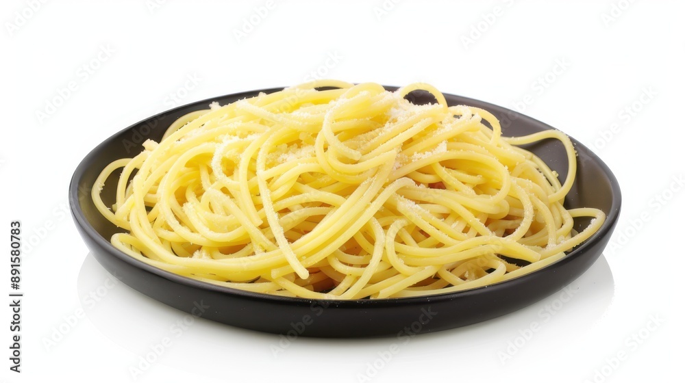 Delicious spaghetti served on a black plate. Delicious spaghetti served on a black plate.