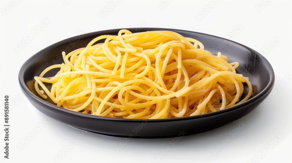 Delicious spaghetti served on a black plate. Delicious spaghetti served on a black plate.
