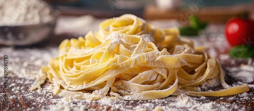 Fresh Homemade Tagliatelle Pasta on Wooden Background