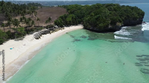 Aerial footage of the scenic Pantai Watu Bella in West Sumba Regency, East Nusa Tenggara, Indonesia photo