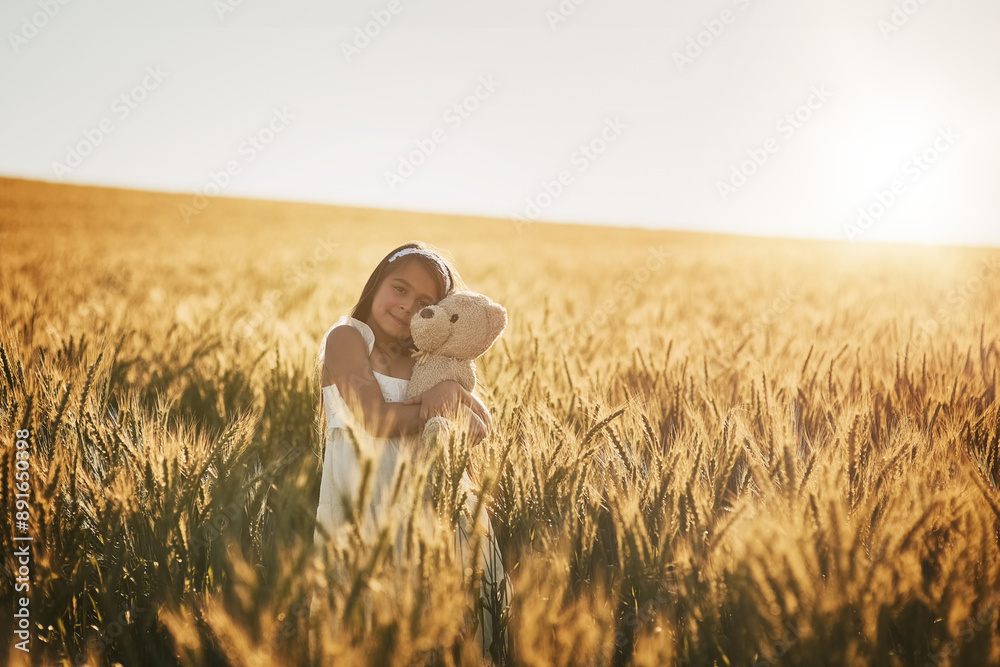 Outdoor portrait, girl and teddy bear hug for development, security and mockup space in cornfield. Young child, safety and embrace with toy animal for bonding friends, growth and peace in nature Outdoor portrait, girl and teddy bear hug for development, security and mockup space in cornfield. Young child, safety and embrace with toy animal for bonding friends, growth and peace in nature