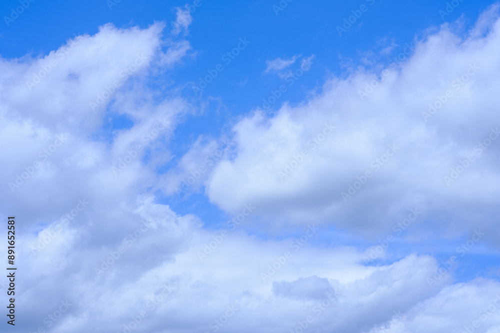 white cumulus clouds on a windy summer day white cumulus clouds on a windy summer day