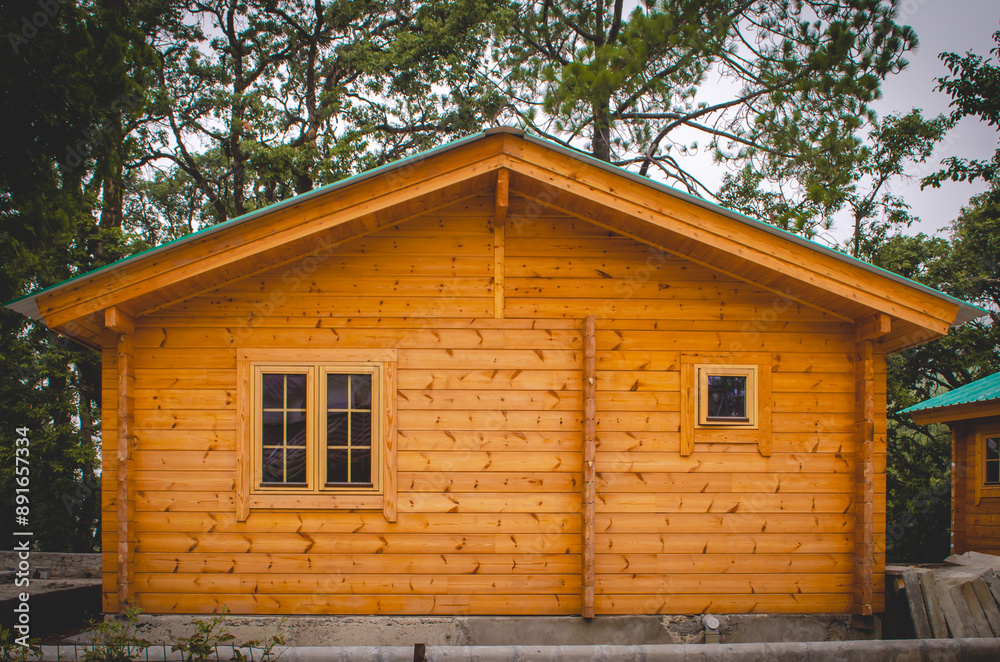 A small wooden cabin with a green roof in Lansdowne, Uttarakhand, India A small wooden cabin with a green roof in Lansdowne, Uttarakhand, India