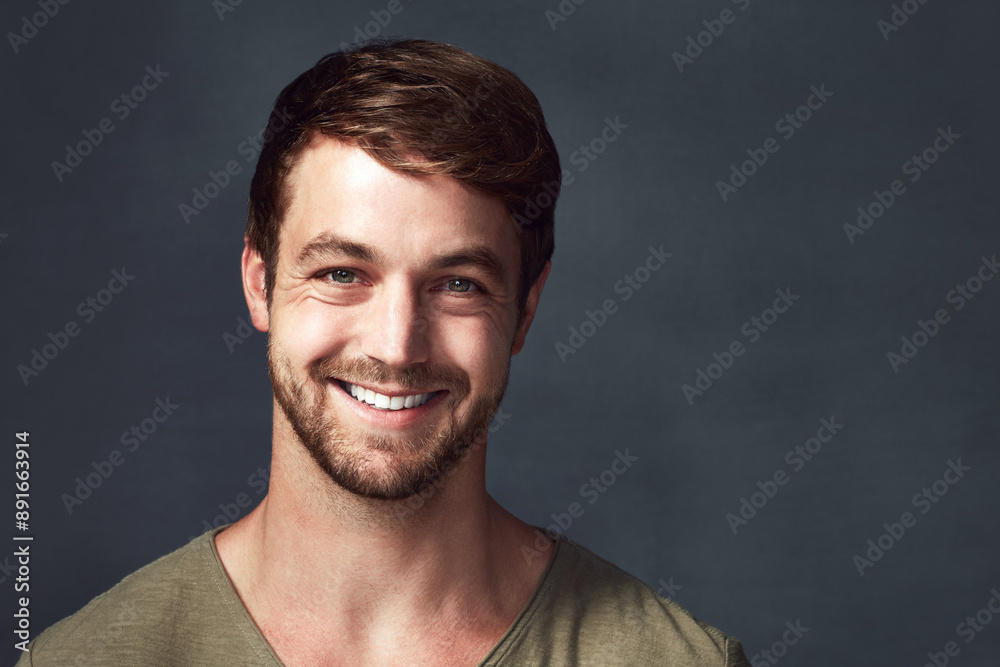 Smile, portrait and man in studio mockup with confidence, trust and creative startup opportunity. Entrepreneur, professional designer or happy small business owner on dark background space with pride Smile, portrait and man in studio mockup with confidence, trust and creative startup opportunity. Entrepreneur, professional designer or happy small business owner on dark background space with pride
