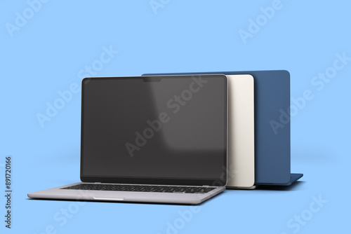 Obraz na płótnie new different color empty screan laptops presentation front 3d render on blue w salonie