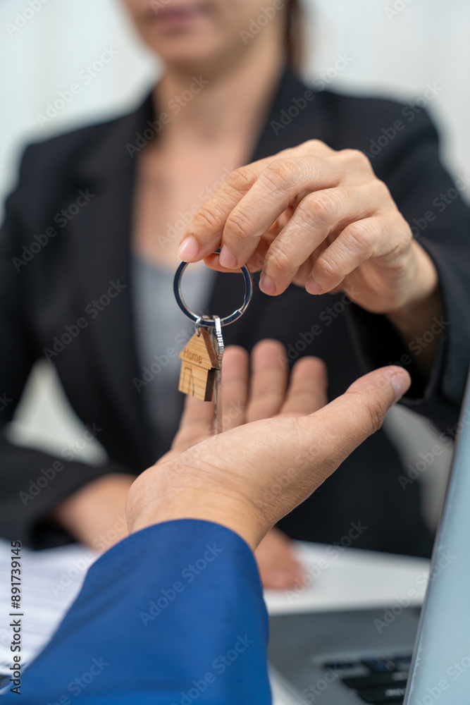 Real estate company to buy houses and land are delivering keys and houses to customers after agreeing to make a home purchase agreement and Real estate company to buy houses and land are delivering keys and houses to customers after agreeing to make a home purchase agreement and