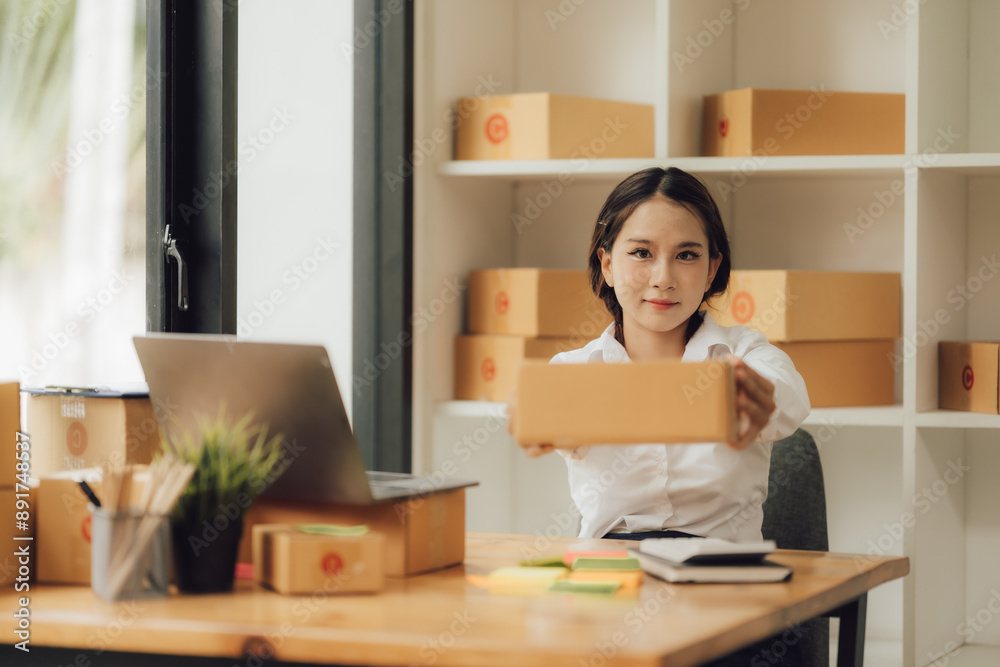Starting Small business entrepreneur SME freelance,Portrait young woman working at home office, BOX,smartphone,laptop, online, marketing, Starting Small business entrepreneur SME freelance,Portrait young woman working at home office, BOX,smartphone,laptop, online, marketing,