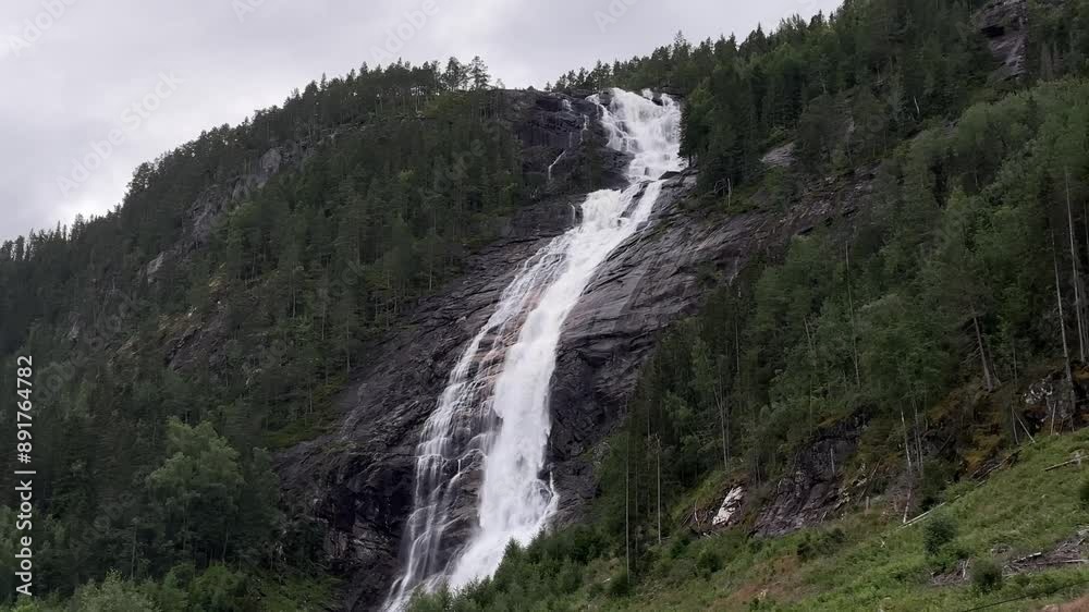 Reiarsfossen waterfall in Bygland, Norway. Reiarsfossen waterfall in Bygland, Norway.