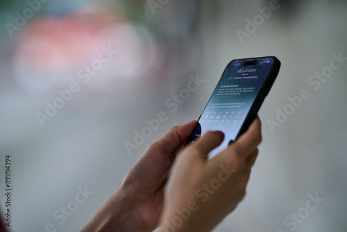 Mobile phone in female hands. 