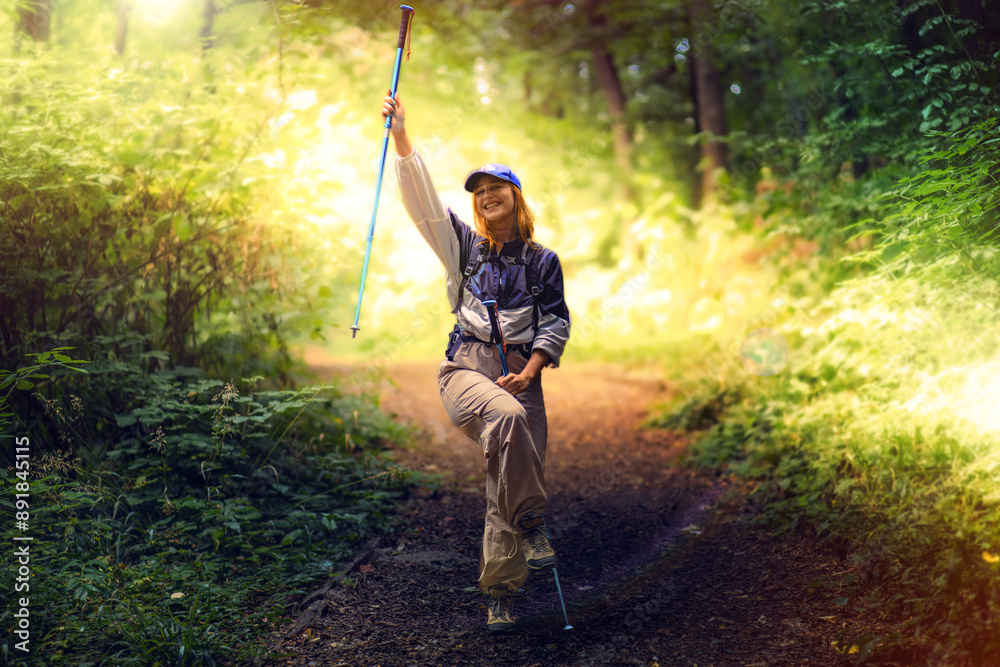 Beautiful young women with big backpack hiking in the deep forest Beautiful young women with big backpack hiking in the deep forest