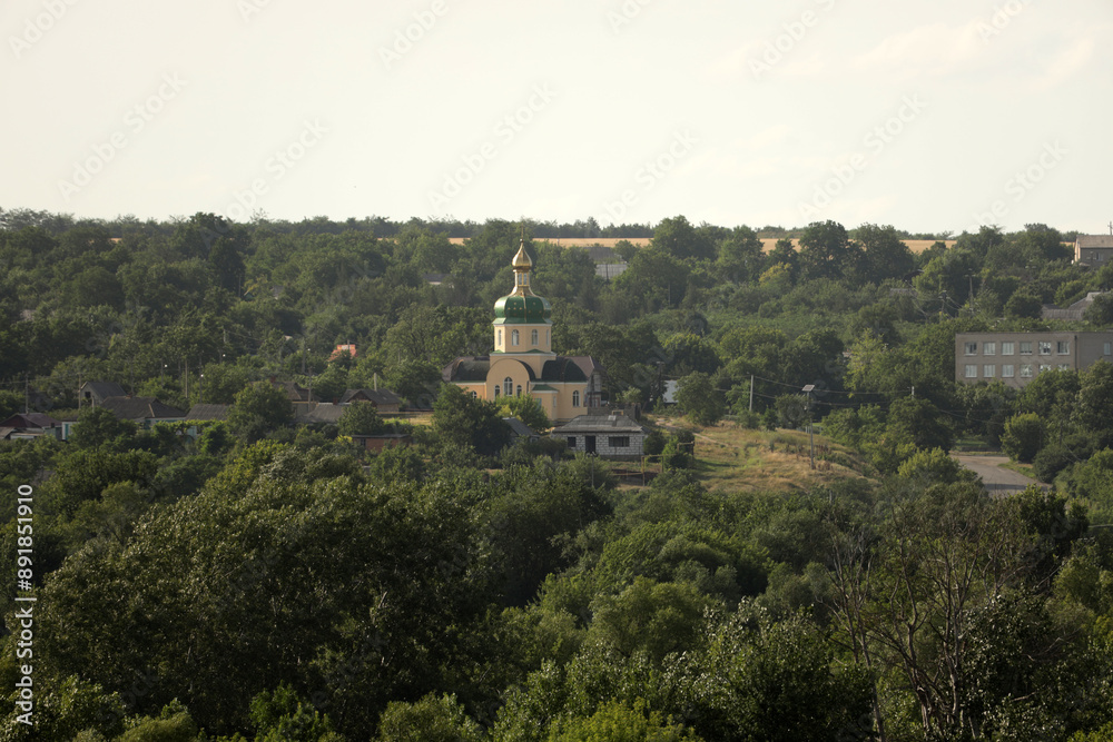 Orthodox church on a green hill Orthodox church on a green hill