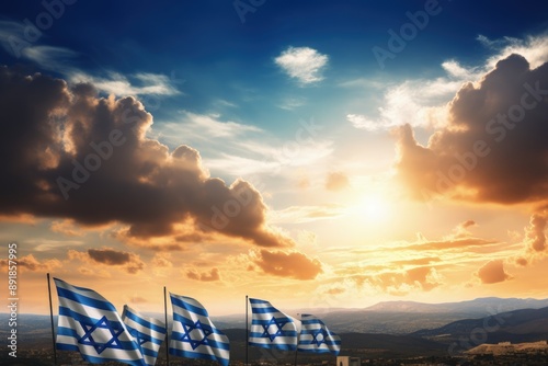 Israel flags with star of David over the sunrise photo