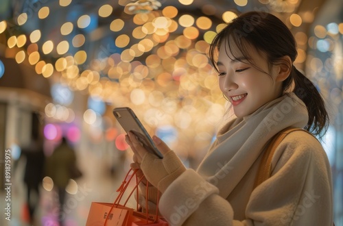 Woman Using Phone Under Christmas Lights