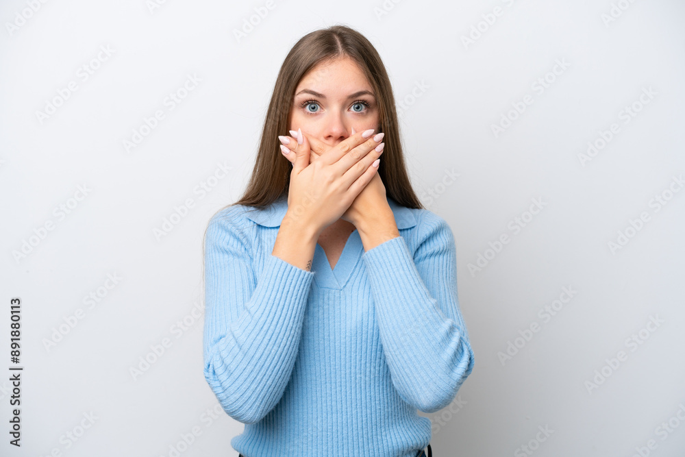Young Lithuanian woman isolated on white background covering mouth with hands Young Lithuanian woman isolated on white background covering mouth with hands