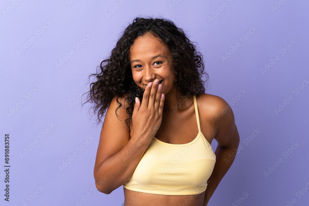Teenager cuban girl isolated on purple background happy and smiling covering mouth with hand Teenager cuban girl isolated on purple background happy and smiling covering mouth with hand