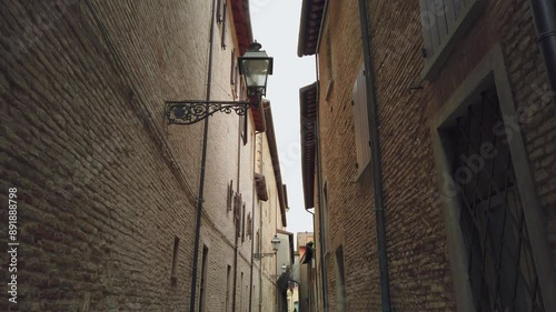 Narrow street of the historic center in Forlì, Italy