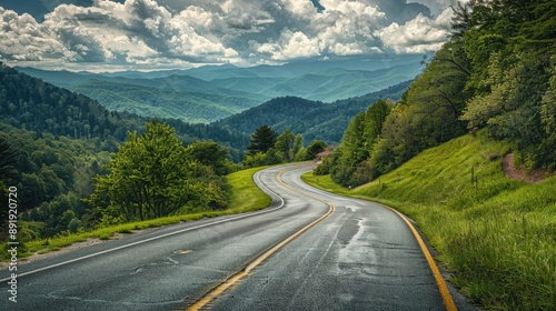 Scenic route towards the Great Smoky Mountains National Park, Tennessee, with a long road winding through picturesque landscapes