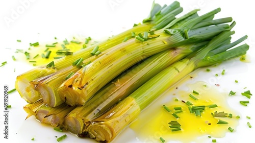 Traditional Turkish Zeytinyagli Pirasa, leeks in olive oil with fresh herbs, isolated on white photo