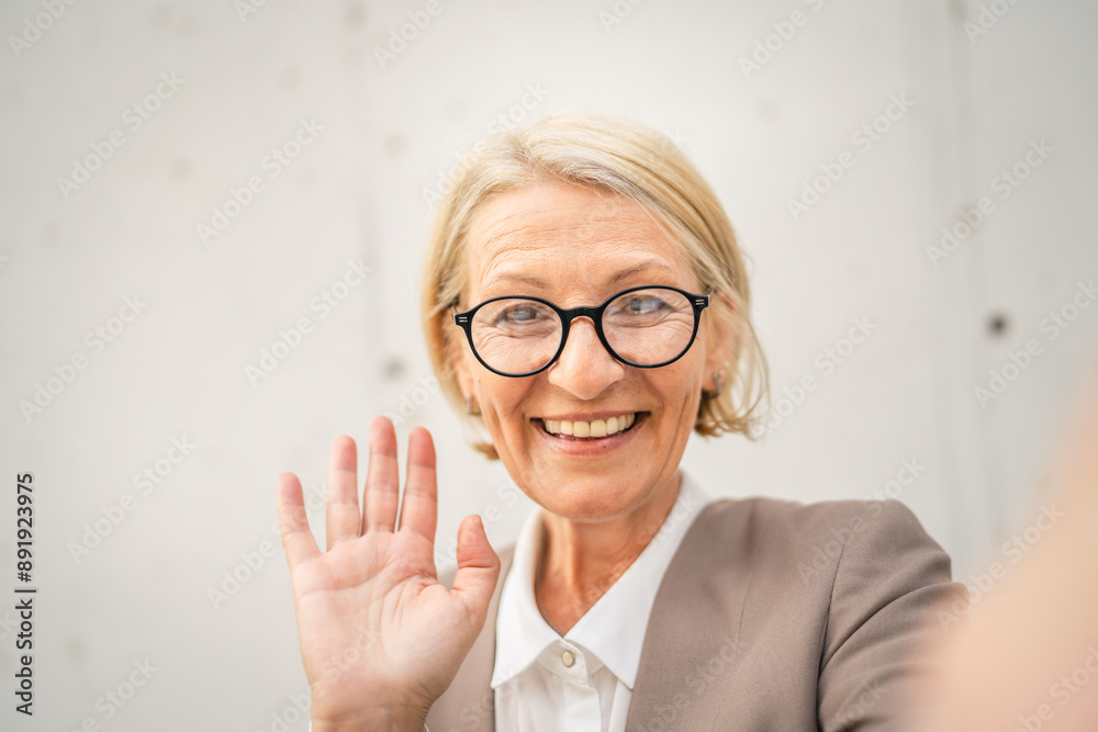 © Miljan Živković - Portrait of one caucasian blonde mature businesswoman stand outdoor