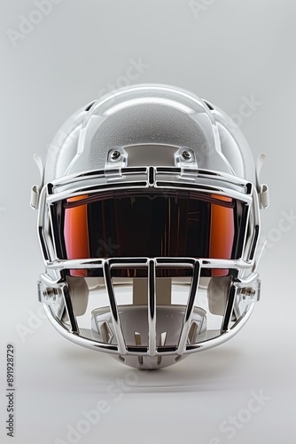 A high-resolution photograph of a modern football helmet with a visor, detailed and sleek, front-facing view. photo