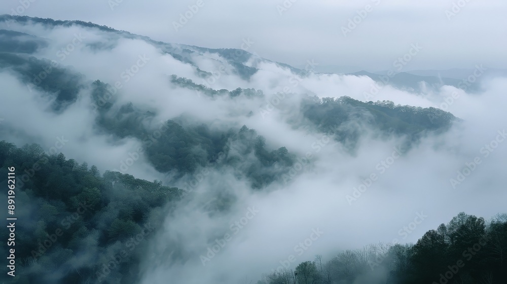 Smoky mountain landscape with layers of mist and fog Smoky mountain landscape with layers of mist and fog
