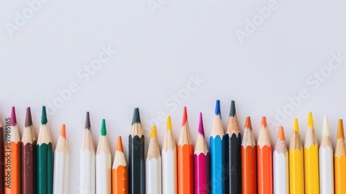 Colorful school pencils against white backdrop symbolizing back to school season