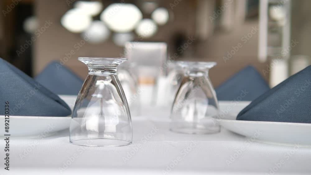 served and decorated round festive table in a restaurant served and decorated round festive table in a restaurant