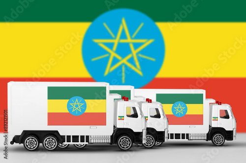 Ethiopia flag depicted on side wall of white delivery van close up. Shipping and local delivery concept photo