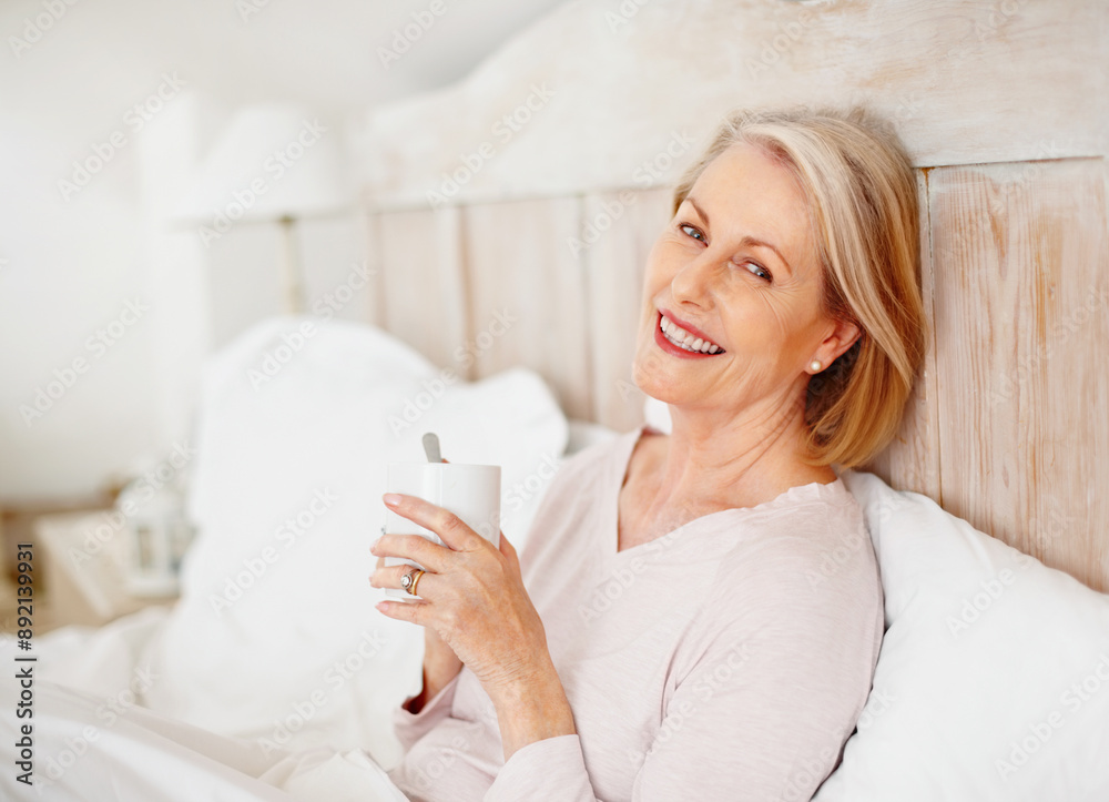 Senior woman, portrait and drinking tea in bedroom for relax or comfort on weekend with break, rest and reflection. Elderly, female person and remember in happiness, morning routine or memory in home Senior woman, portrait and drinking tea in bedroom for relax or comfort on weekend with break, rest and reflection. Elderly, female person and remember in happiness, morning routine or memory in home