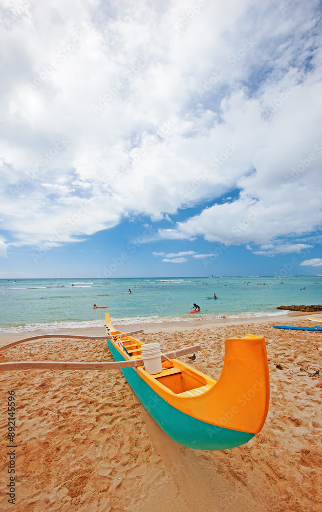 Beach, transport and boat on sand for adventure, summer vacation and blue sky with clouds. Island paradise, tropical and colorful canoe by ocean for holiday break, water travel and horizon in Hawaii Beach, transport and boat on sand for adventure, summer vacation and blue sky with clouds. Island paradise, tropical and colorful canoe by ocean for holiday break, water travel and horizon in Hawaii