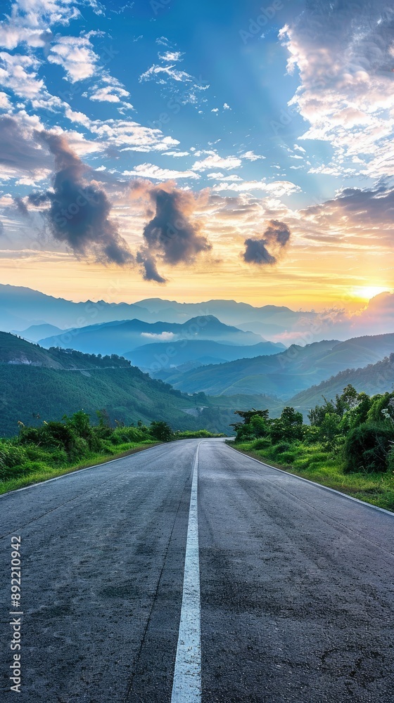 Naklejka premium Asphalt road square and green mountain with sky clouds natural landscape at sunrise