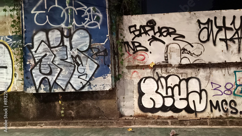 Walls covered in graffiti in the city of Jakarta